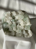 Beautiful crystal specimen featuring green apophyllite and stilbite, showcasing intricate formations and textures.