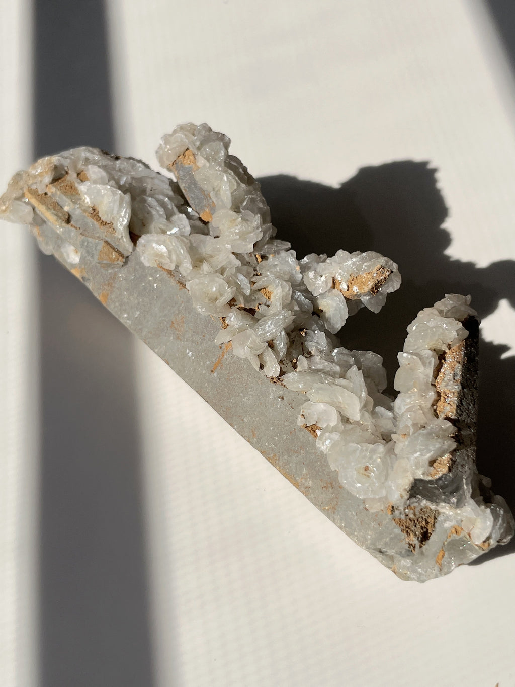 Beautiful flower calcite specimen with quartz inclusions, showcasing natural textures and colors.
