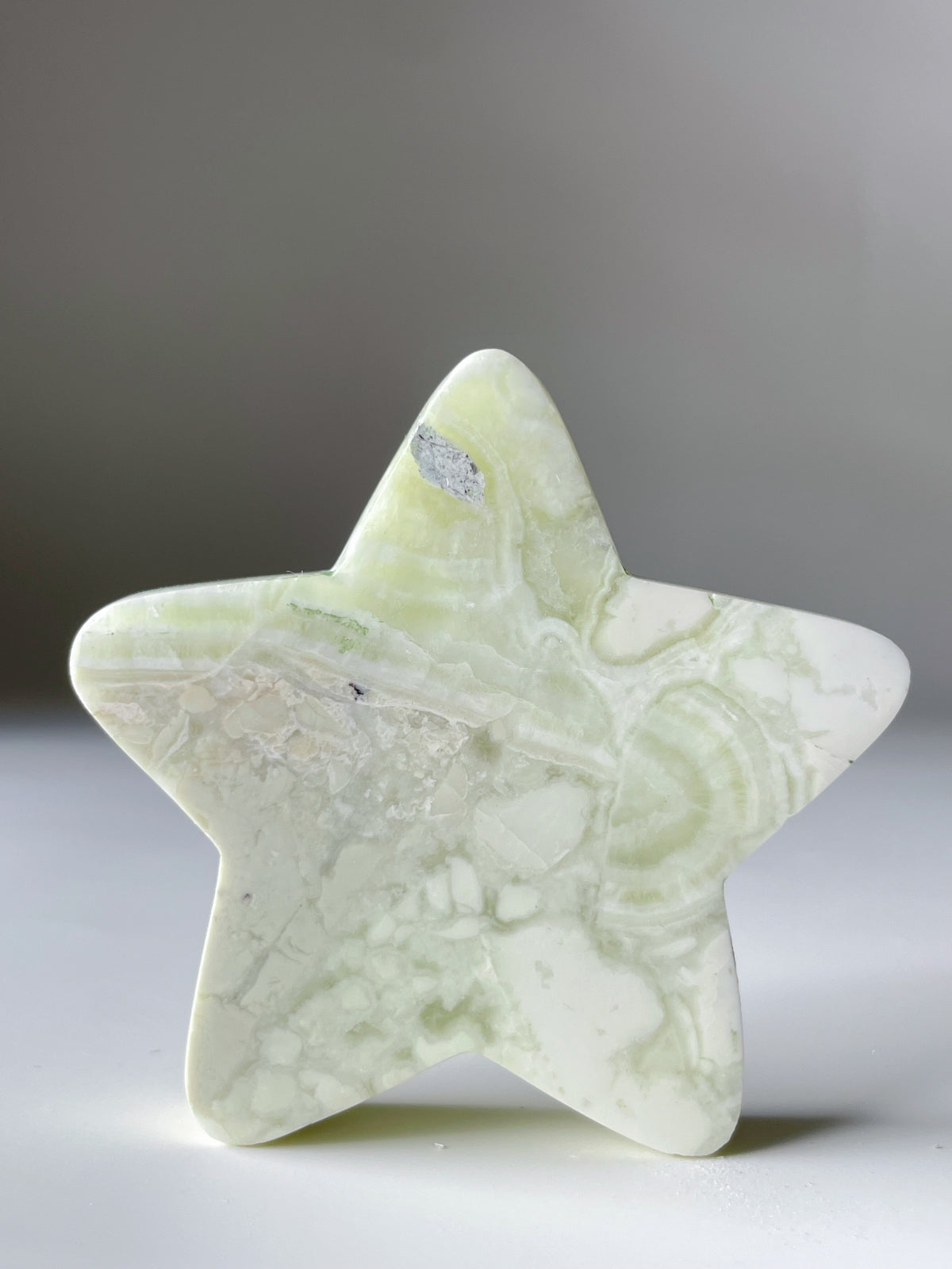 Green Maligano Jasper star shaped specimen with unique patterns and textures, showcasing its natural beauty.