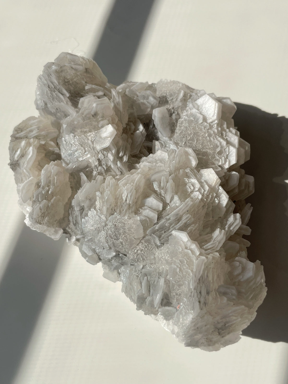 Biscuit calcite specimen with intricate crystal formations, showcasing a beautiful array of textures and colors.