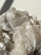 Beautiful crystal specimen featuring intricate layers and textures of biscuit calcite from Fujian, China.