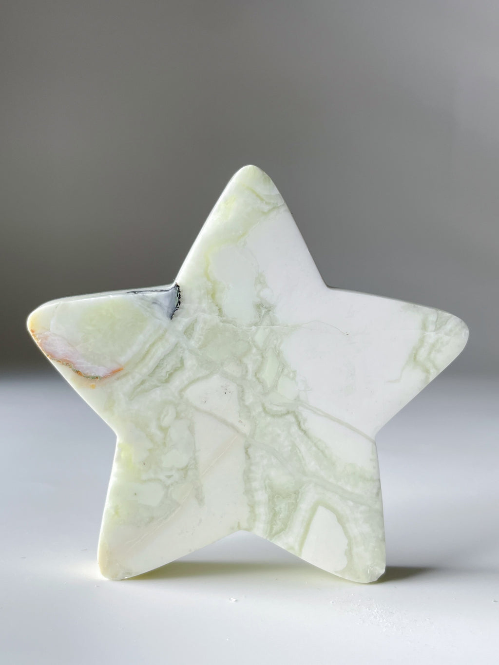 Green Maligano Jasper star shaped crystal specimen with intricate patterns, showcasing its unique beauty.