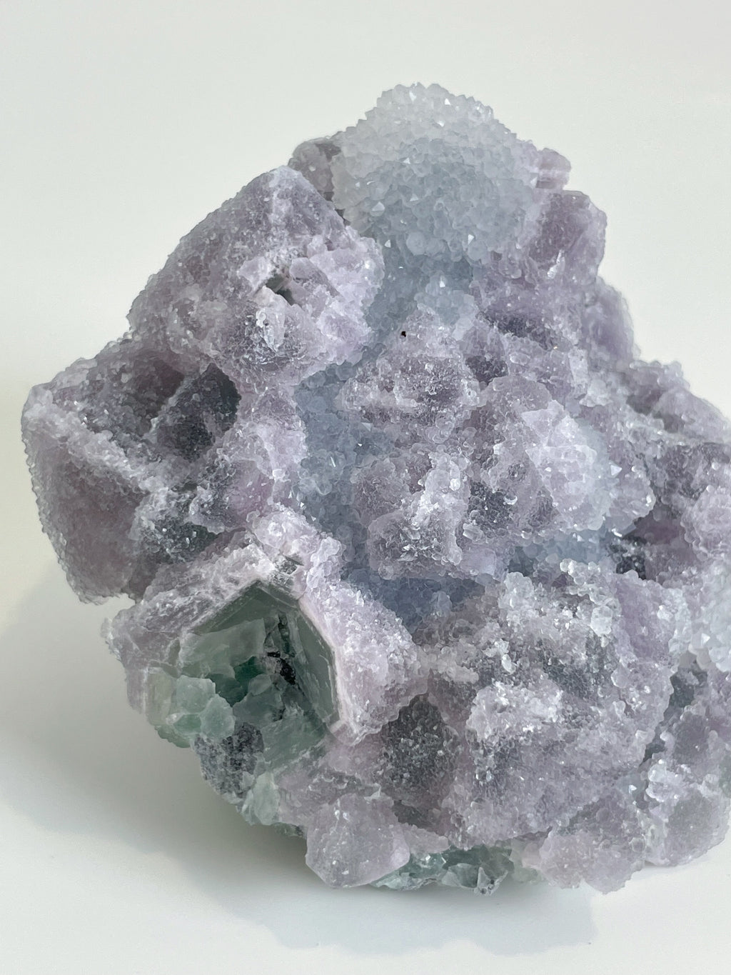 Beautiful crystal specimen of 1KG Sugar Fluorite with a soft lavender hue and sparkling texture.