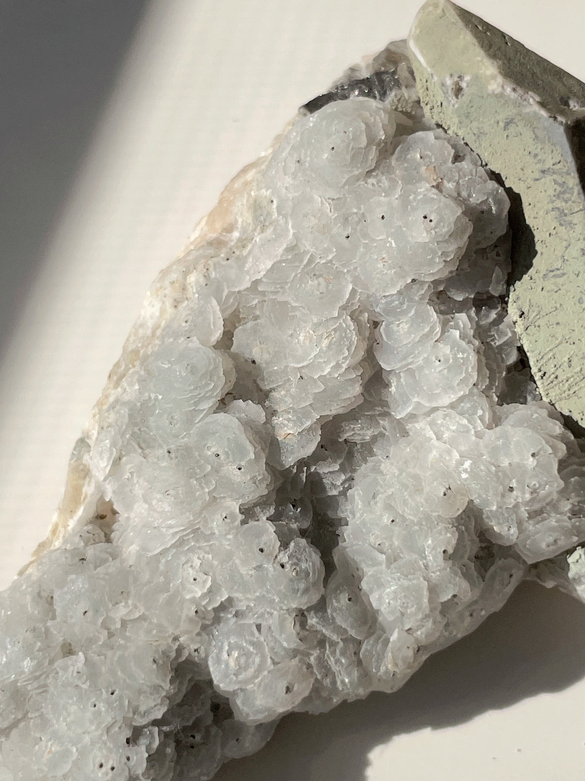 Beautiful crystal specimen featuring delicate, rounded formations with a soft, shimmering surface.