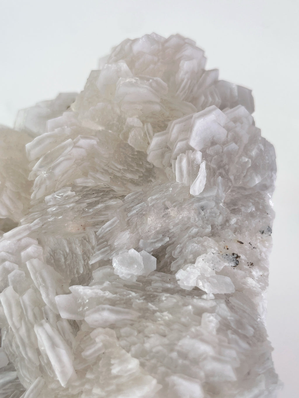 Beautiful Biscuit Calcite specimen showcasing intricate crystal formations with a soft, translucent appearance.