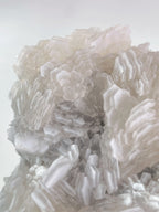 Beautiful crystal specimen featuring intricate layers of Biscuit Calcite from Fujian, China.