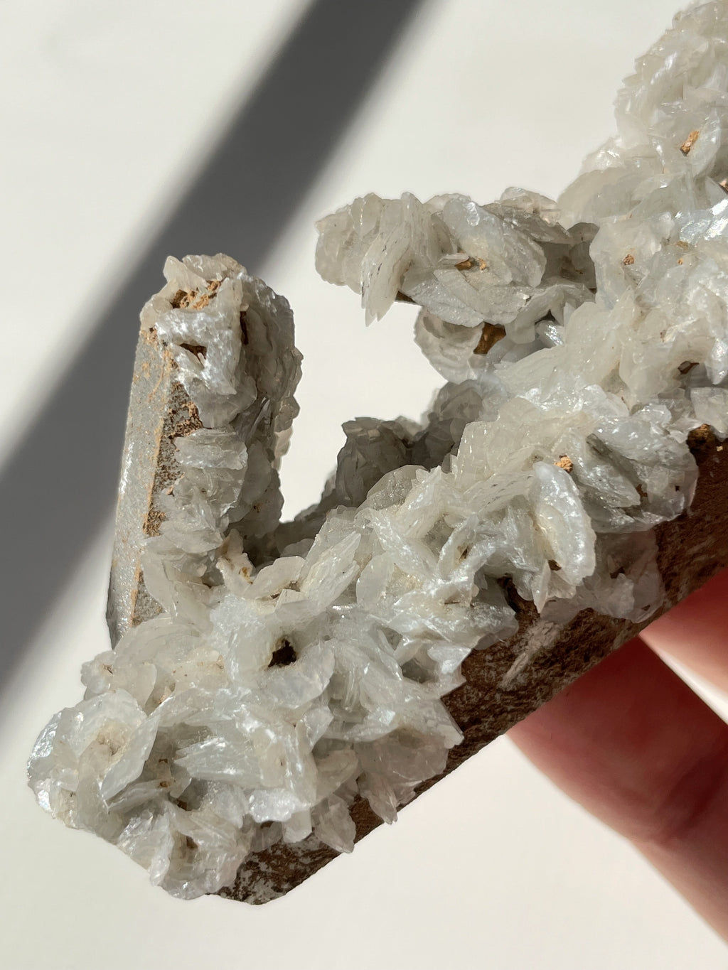 Beautiful crystal specimen featuring flower calcite on chlorite-included quartz, showcasing intricate formations.