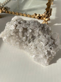Beautiful pyrite and calcite crystal specimen on quartz, showcasing sparkling textures and natural formations.