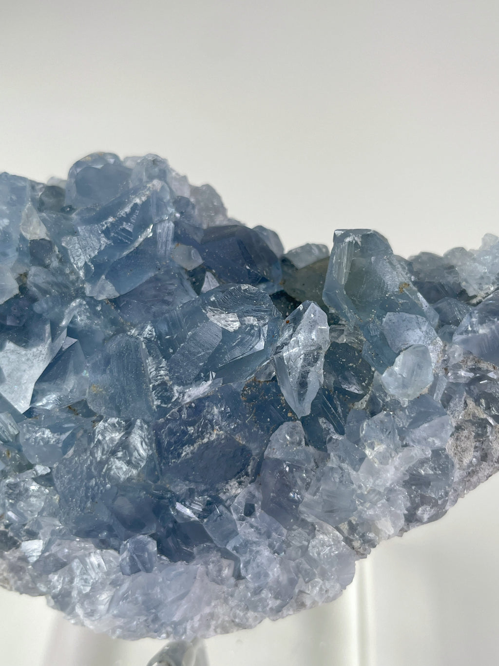 Beautiful Madagascar celestite cluster showcasing shimmering blue crystal formations.
