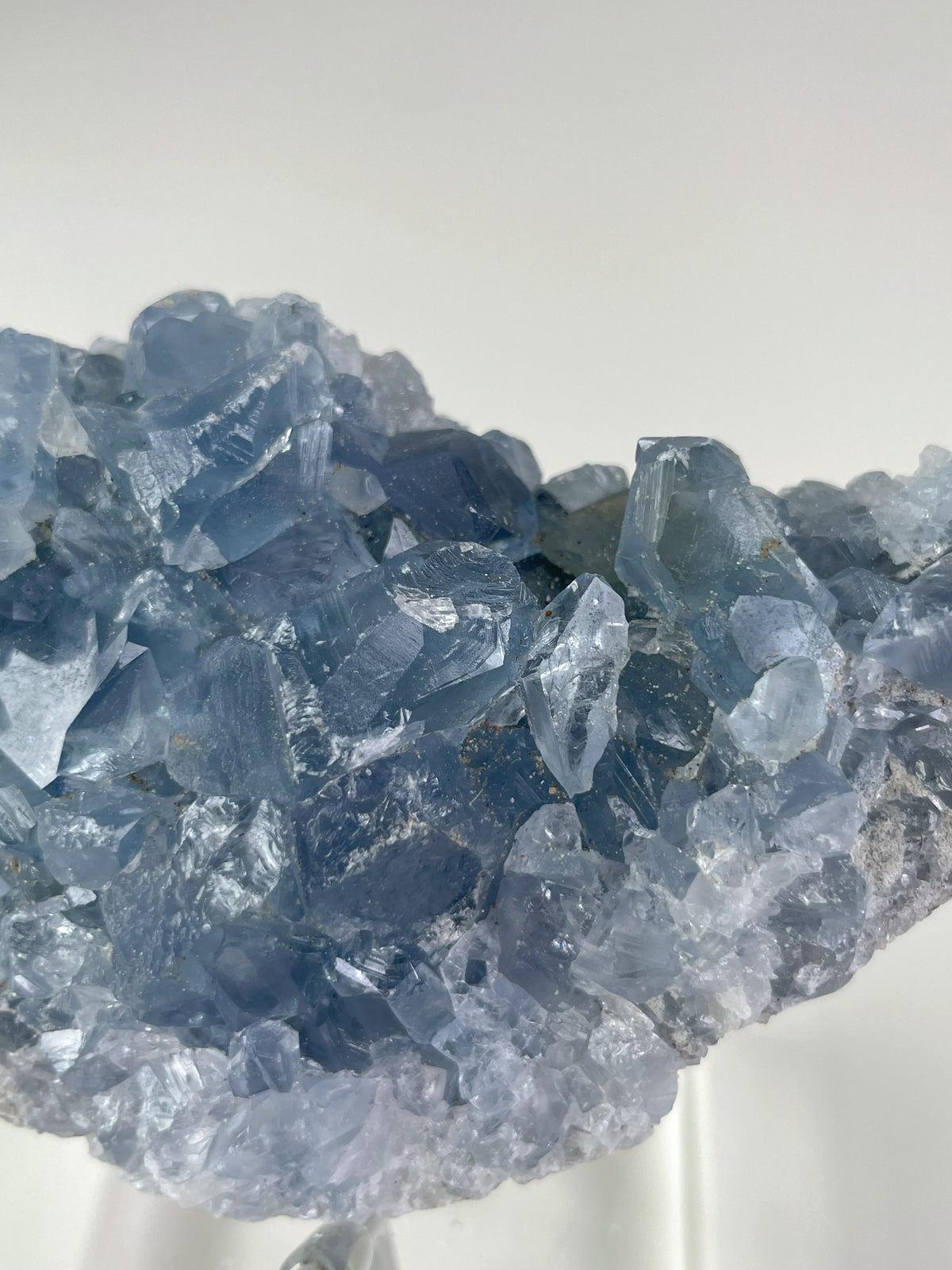Beautiful Madagascar celestite cluster showcasing shimmering blue crystal formations.
