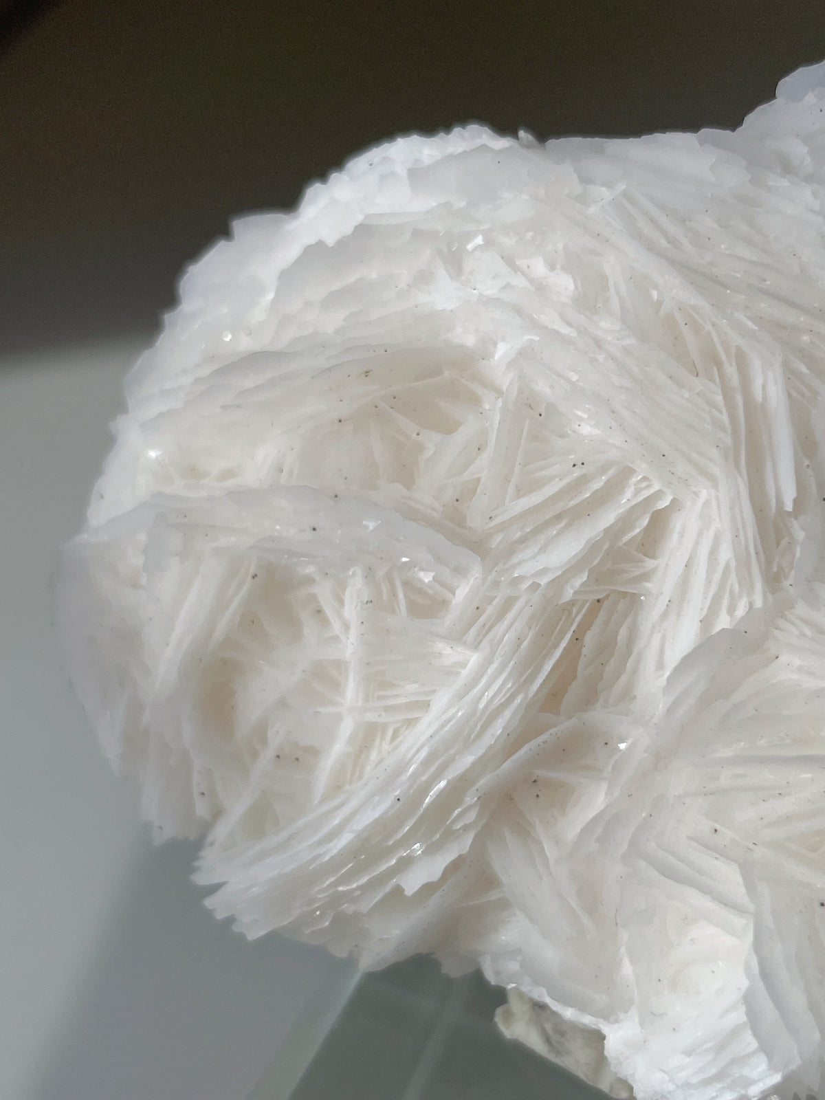 Beautiful specimen of Thousand-layer Petal Calcite with delicate, layered textures and a soft white hue.