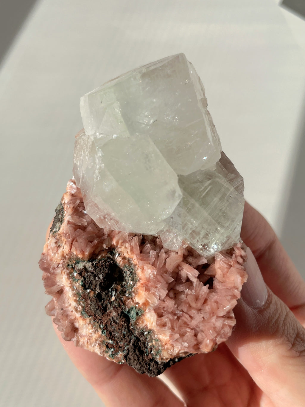 Beautiful pink Heulandite and Apophyllite crystal specimen, showcasing intricate formations and textures.