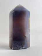 Druzy Agate Tower with smooth, polished surfaces showcasing shades of purple and hints of gold.