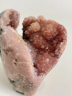 Beautiful botryoidal pink amethyst freeform crystal specimen with sparkling facets and natural textures.