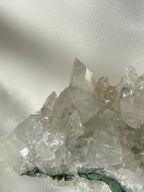 A stunning apophyllite cluster showcasing sparkling, clear crystals with a natural formation.