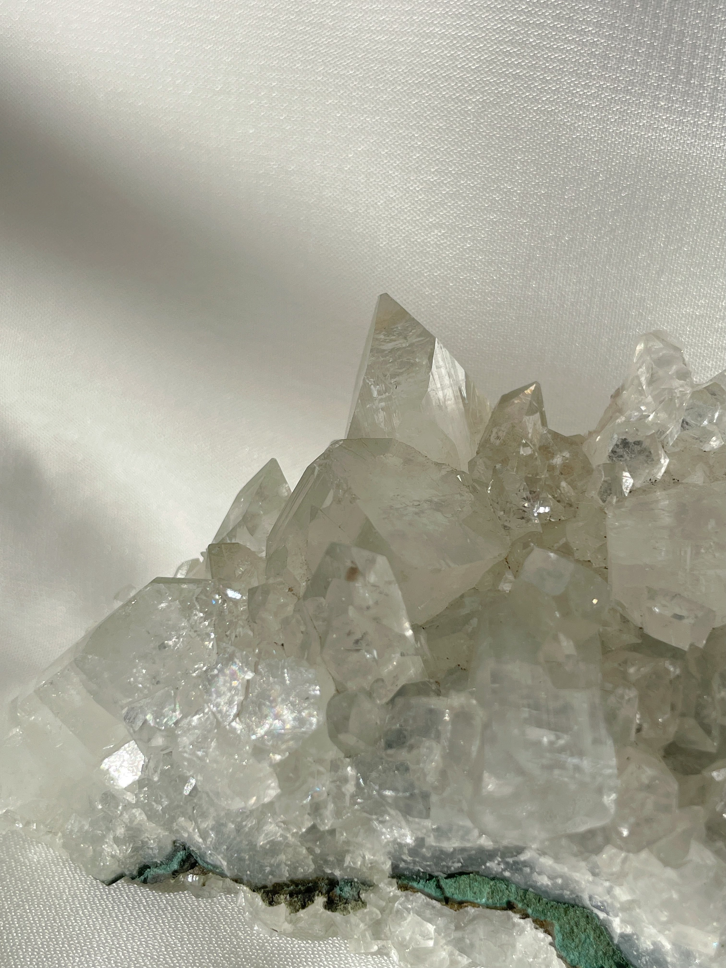 A stunning apophyllite cluster showcasing sparkling, clear crystals with a natural formation.