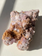 Beautiful purple creedite crystal specimen with sparkling textures and earthy tones, showcasing natural mineral formations.