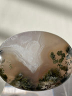 Scenic moss agate palm stone featuring earthy tones and intricate green patterns, beautifully polished.