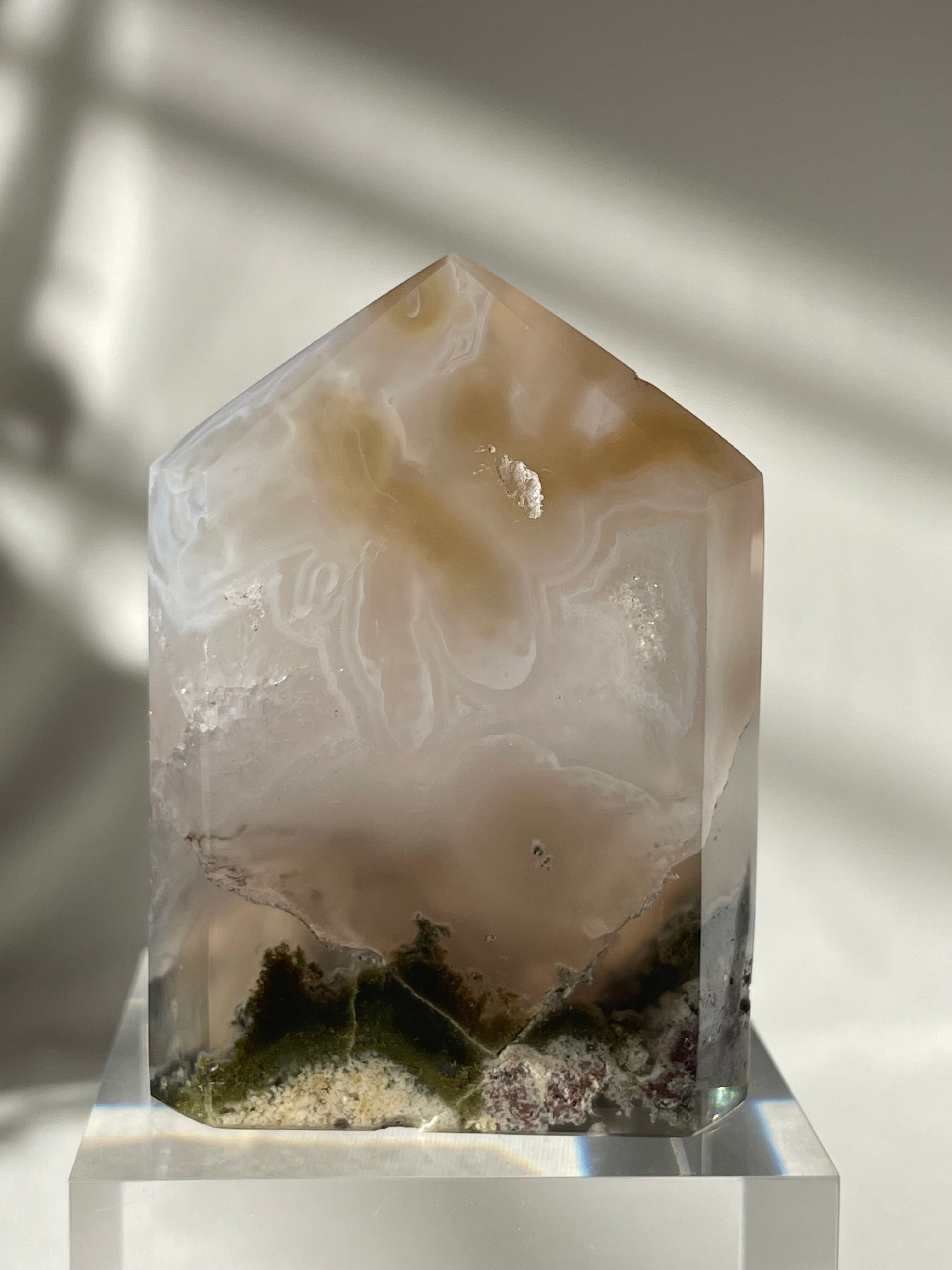 Scenic moss agate tower with earthy tones, showcasing intricate patterns and a polished finish.