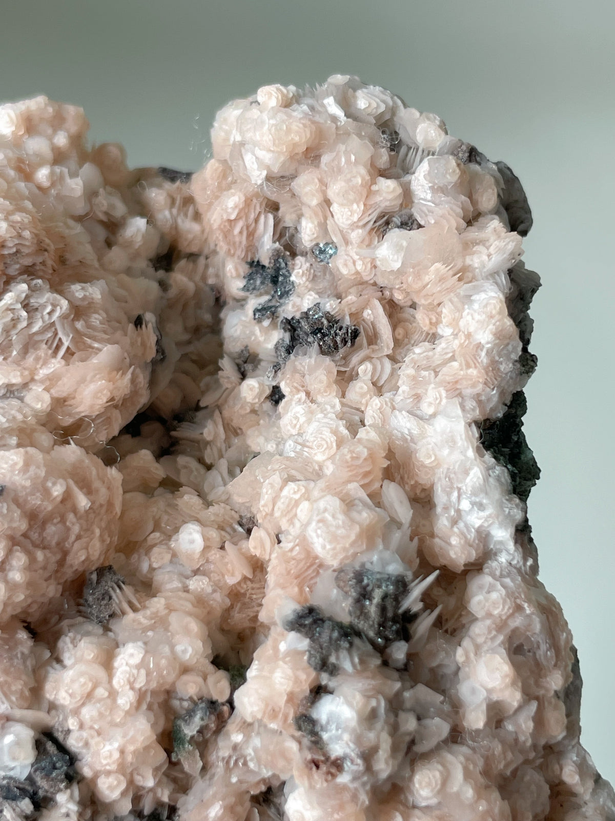 Beautiful pink calcite with quartz and arsenopyrite, showcasing intricate crystal formations and textures.