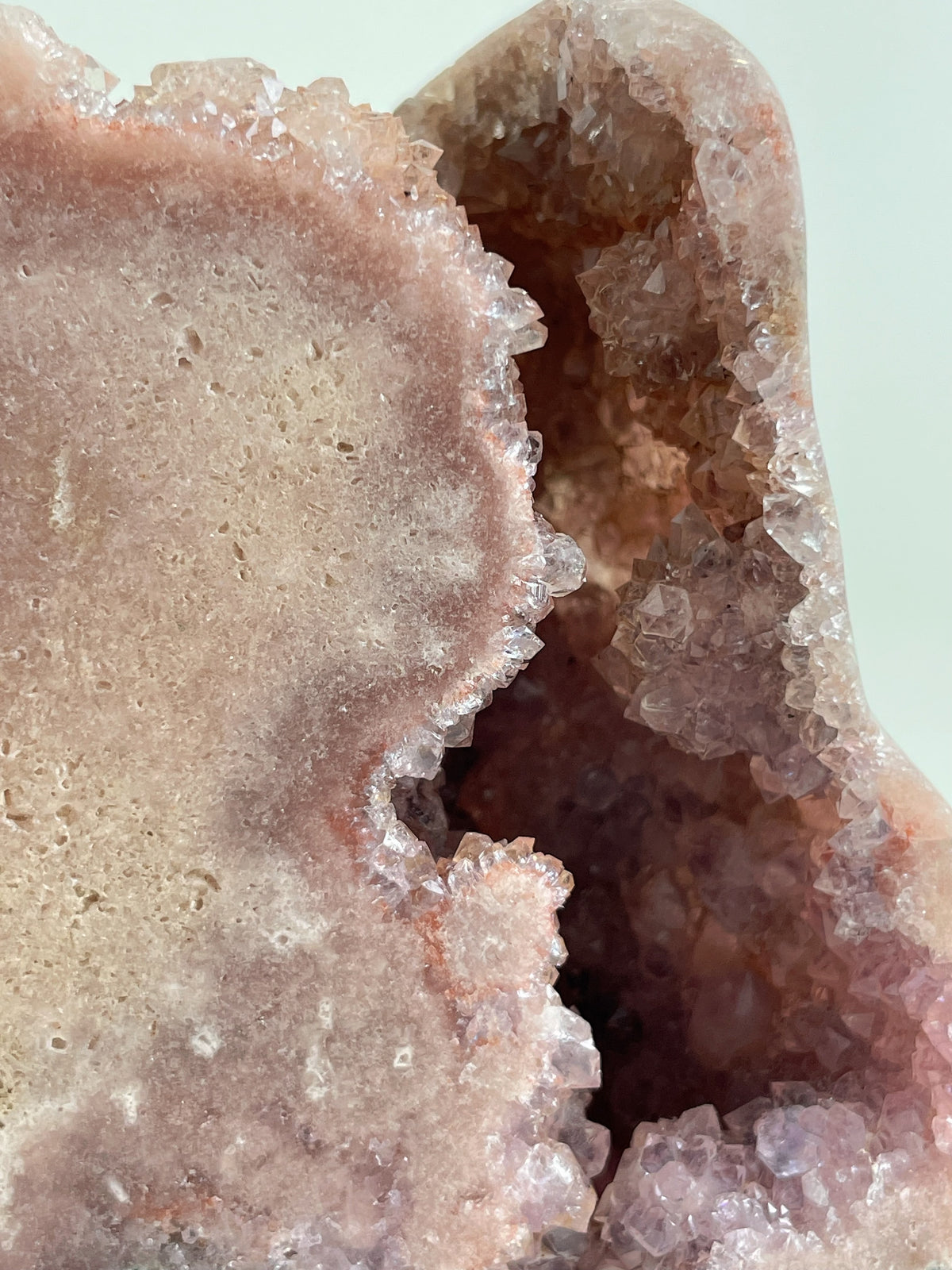 Beautiful botryoidal pink amethyst freeform specimen showcasing shimmering crystal formations.